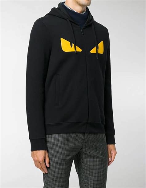 black fendi hoodie with yellow eyes|fendi monster eyes zip.